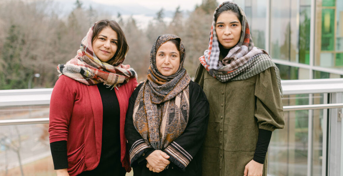Image: After evacuating Afghanistan following the Taliban’s return to power, Judges Freshta Masomi (left), Zamila Sangar (centre) and Wahida Rahimi (right) joined Allard Law through the law school’s new Afghan Women Judges Program. Photo credit: Macy Yap.